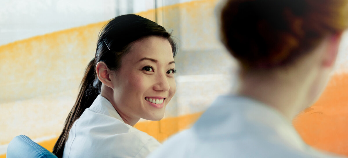 color Image of two people working at the office